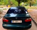 Зеленый Дэу Ланос, объемом двигателя 1.6 л и пробегом 257 тыс. км за 3300 $, фото 1 на Automoto.ua