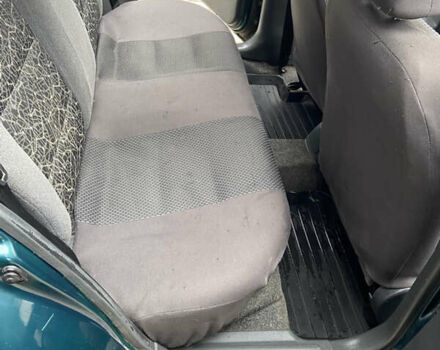 Зелений Деу Ланос, об'ємом двигуна 1.5 л та пробігом 210 тис. км за 1950 $, фото 9 на Automoto.ua