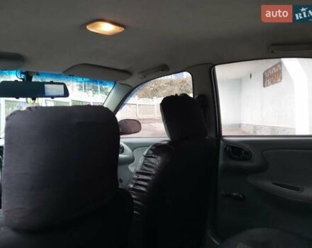 Зелений Деу Ланос, об'ємом двигуна 1.39 л та пробігом 260 тис. км за 2400 $, фото 4 на Automoto.ua
