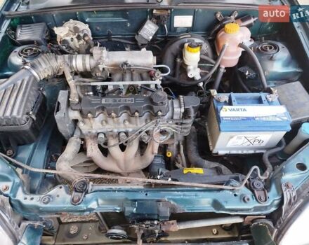 Зеленый Дэу Ланос, объемом двигателя 1.5 л и пробегом 400 тыс. км за 1850 $, фото 4 на Automoto.ua