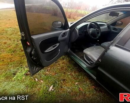 Зеленый Дэу Ланос, объемом двигателя 1.3 л и пробегом 350 тыс. км за 1200 $, фото 4 на Automoto.ua