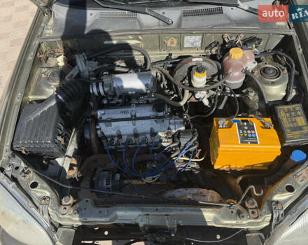 Зелений Деу Ланос, об'ємом двигуна 1.4 л та пробігом 555 тис. км за 875 $, фото 8 на Automoto.ua