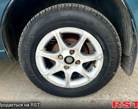 Дэу Ланос 2007 в Запорожье на Automoto.ua Зеленый Дэу Ланос, объемом двигателя 1.5 л и пробегом 154 тыс. км за 1650 $, фото 9 на Automoto.ua