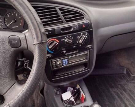 Зеленый Дэу Ланос, объемом двигателя 1.6 л и пробегом 109 тыс. км за 3400 $, фото 13 на Automoto.ua