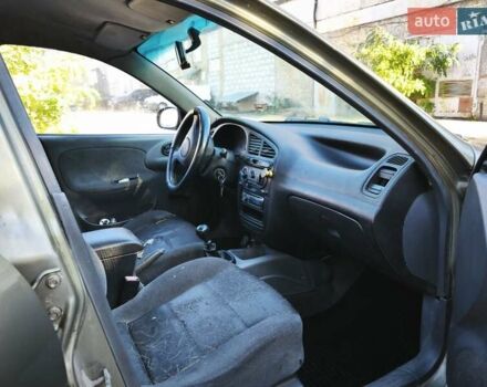 Зеленый Дэу Ланос, объемом двигателя 1.6 л и пробегом 375 тыс. км за 1800 $, фото 5 на Automoto.ua