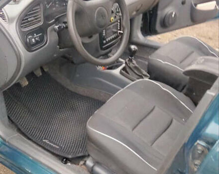 Зеленый Дэу Ланос, объемом двигателя 1.6 л и пробегом 150 тыс. км за 1500 $, фото 4 на Automoto.ua