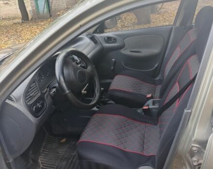 Зелений Деу Ланос, об'ємом двигуна 1.5 л та пробігом 228 тис. км за 2000 $, фото 4 на Automoto.ua