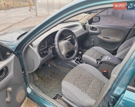 Зелений Деу Ланос, об'ємом двигуна 1.5 л та пробігом 147 тис. км за 2200 $, фото 8 на Automoto.ua