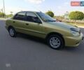 Зеленый Дэу Ланос, объемом двигателя 1.3 л и пробегом 170 тыс. км за 1999 $, фото 1 на Automoto.ua