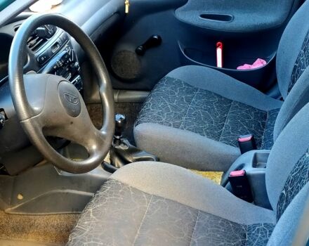 Зеленый Дэу Ланос, объемом двигателя 1.5 л и пробегом 136 тыс. км за 2200 $, фото 4 на Automoto.ua