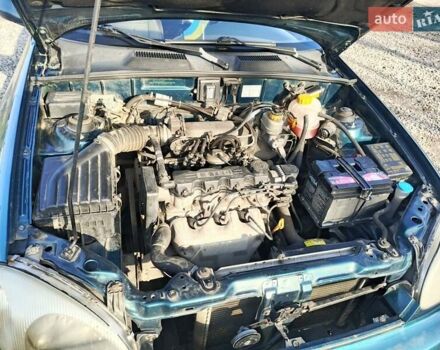 Зеленый Дэу Ланос, объемом двигателя 1.5 л и пробегом 182 тыс. км за 1999 $, фото 3 на Automoto.ua