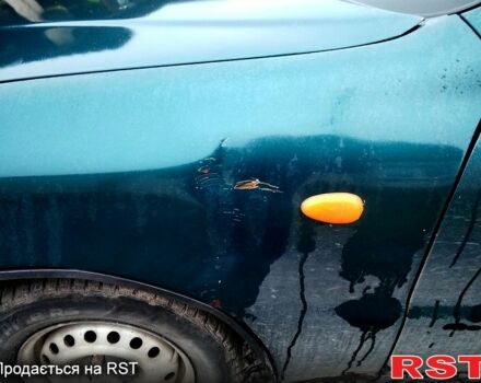 Зелений Деу Ланос, об'ємом двигуна 1.4 л та пробігом 188 тис. км за 1400 $, фото 7 на Automoto.ua