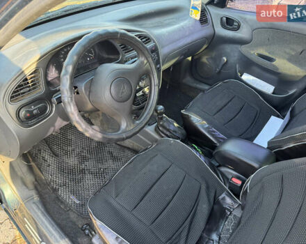 Зеленый Дэу Ланос, объемом двигателя 1.5 л и пробегом 170 тыс. км за 1900 $, фото 9 на Automoto.ua