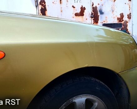 Зеленый Дэу Ланос, объемом двигателя 1.5 л и пробегом 287 тыс. км за 1200 $, фото 5 на Automoto.ua