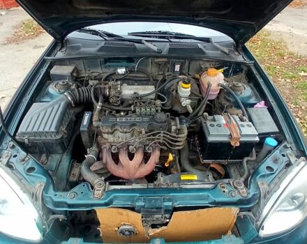 Зеленый Дэу Ланос, объемом двигателя 1.5 л и пробегом 230 тыс. км за 2250 $, фото 6 на Automoto.ua