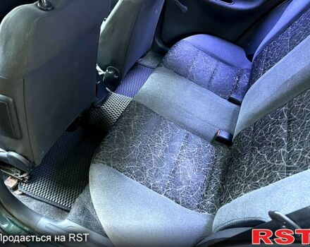 Зеленый Дэу Ланос, объемом двигателя 1.6 л и пробегом 257 тыс. км за 3300 $, фото 3 на Automoto.ua