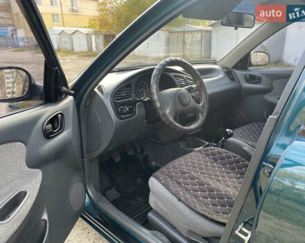 Деу Ланос 2007 у Запоріжжя на Automoto.ua Зелений Деу Ланос, об'ємом двигуна 1.5 л та пробігом 256 тис. км за 3000 $, фото 8 на Automoto.ua