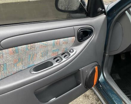 Зеленый Дэу Ланос, объемом двигателя 1.6 л и пробегом 290 тыс. км за 1499 $, фото 4 на Automoto.ua