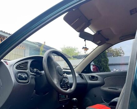 Зеленый Дэу Ланос, объемом двигателя 1.4 л и пробегом 316 тыс. км за 1200 $, фото 1 на Automoto.ua