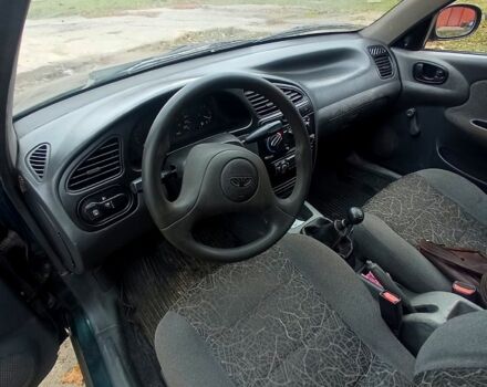 Зеленый Дэу Ланос, объемом двигателя 1.5 л и пробегом 230 тыс. км за 2250 $, фото 5 на Automoto.ua