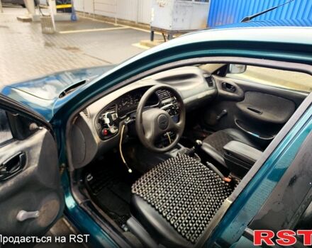 Зеленый Дэу Ланос, объемом двигателя 1.5 л и пробегом 283 тыс. км за 2200 $, фото 10 на Automoto.ua