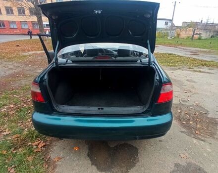 Зеленый Дэу Ланос, объемом двигателя 1.5 л и пробегом 230 тыс. км за 2250 $, фото 8 на Automoto.ua