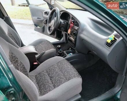 Дэу Ланос 2007 в Днепре (Днепропетровске) на Automoto.ua Зеленый Дэу Ланос, объемом двигателя 1.4 л и пробегом 98 тыс. км за 2799 $, фото 18 на Automoto.ua