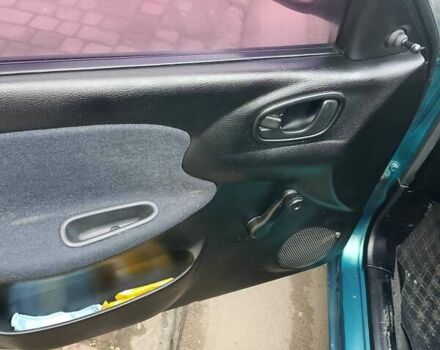 Зеленый Дэу Ланос, объемом двигателя 1.5 л и пробегом 300 тыс. км за 1650 $, фото 6 на Automoto.ua