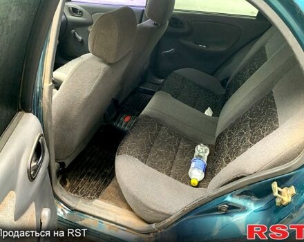 Зеленый Дэу Ланос, объемом двигателя 1.4 л и пробегом 280 тыс. км за 2000 $, фото 8 на Automoto.ua