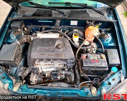 Зеленый Дэу Ланос, объемом двигателя 1.4 л и пробегом 115 тыс. км за 2100 $, фото 4 на Automoto.ua