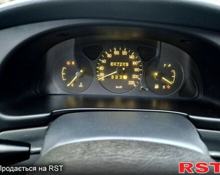 Зеленый Дэу Ланос, объемом двигателя 1.4 л и пробегом 47 тыс. км за 2800 $, фото 10 на Automoto.ua