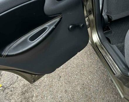 Зелений Деу Ланос, об'ємом двигуна 1.5 л та пробігом 128 тис. км за 2700 $, фото 14 на Automoto.ua