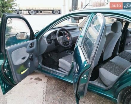 Дэу Ланос 2007 в Днепре (Днепропетровске) на Automoto.ua Зеленый Дэу Ланос, объемом двигателя 1.4 л и пробегом 98 тыс. км за 2799 $, фото 13 на Automoto.ua