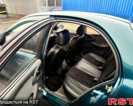 Зеленый Дэу Ланос, объемом двигателя 1.5 л и пробегом 283 тыс. км за 2200 $, фото 9 на Automoto.ua