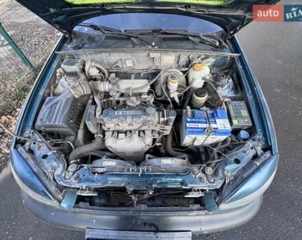 Зелений Деу Ланос, об'ємом двигуна 1.5 л та пробігом 304 тис. км за 2400 $, фото 28 на Automoto.ua