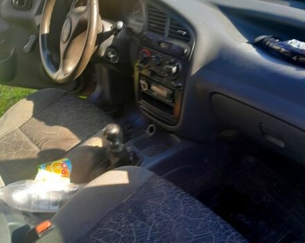 Зеленый Дэу Ланос, объемом двигателя 1.5 л и пробегом 250 тыс. км за 1650 $, фото 3 на Automoto.ua