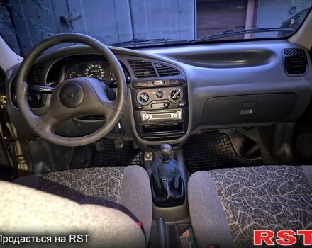 Зеленый Дэу Ланос, объемом двигателя 1.4 л и пробегом 47 тыс. км за 2800 $, фото 9 на Automoto.ua