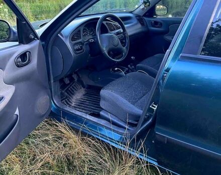 Зеленый Дэу Ланос, объемом двигателя 1.5 л и пробегом 160 тыс. км за 2100 $, фото 1 на Automoto.ua