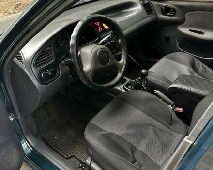 Зеленый Дэу Ланос, объемом двигателя 1.5 л и пробегом 150 тыс. км за 2600 $, фото 6 на Automoto.ua