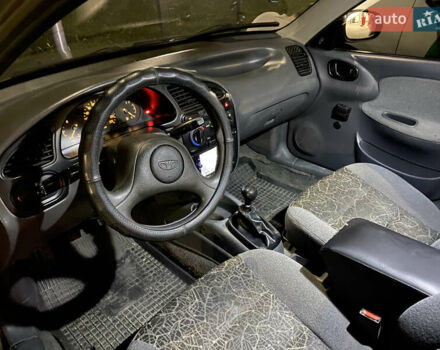 Зеленый Дэу Ланос, объемом двигателя 1.5 л и пробегом 210 тыс. км за 2000 $, фото 9 на Automoto.ua