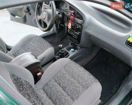 Дэу Ланос 2007 в Днепре (Днепропетровске) на Automoto.ua Зеленый Дэу Ланос, объемом двигателя 1.4 л и пробегом 98 тыс. км за 2799 $, фото 16 на Automoto.ua