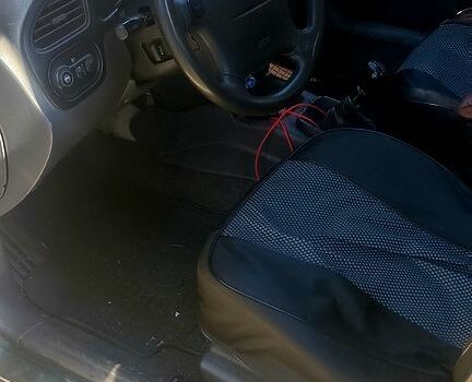 Зеленый Дэу Ланос, объемом двигателя 1.6 л и пробегом 287 тыс. км за 1700 $, фото 4 на Automoto.ua