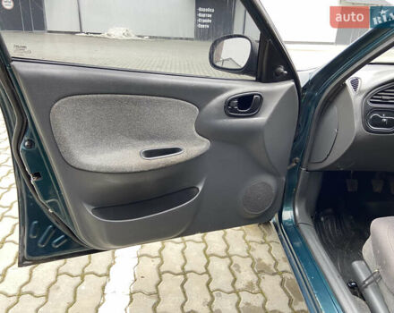 Зелений Деу Ланос, об'ємом двигуна 1.5 л та пробігом 210 тис. км за 1950 $, фото 3 на Automoto.ua