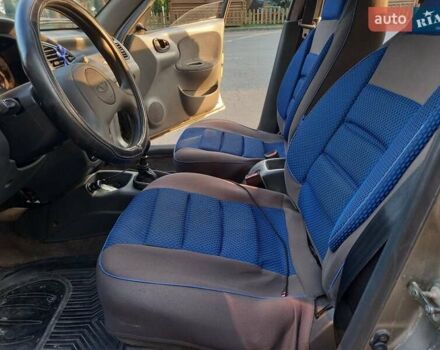 Зеленый Дэу Ланос, объемом двигателя 1.5 л и пробегом 176 тыс. км за 2199 $, фото 24 на Automoto.ua