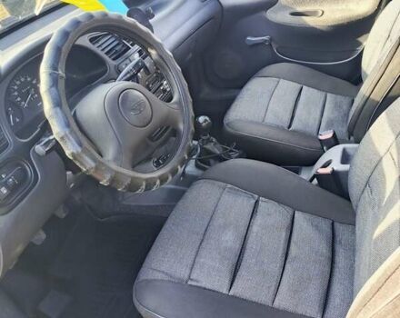 Зеленый Дэу Ланос, объемом двигателя 1.5 л и пробегом 182 тыс. км за 1999 $, фото 1 на Automoto.ua