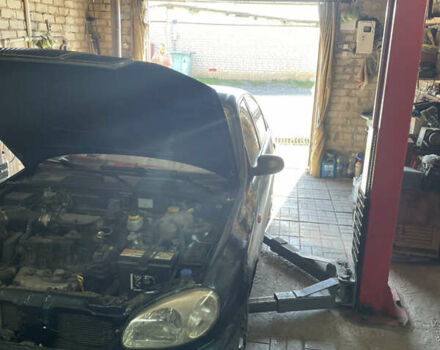 Зеленый Дэу Ланос, объемом двигателя 1.5 л и пробегом 290 тыс. км за 2000 $, фото 4 на Automoto.ua