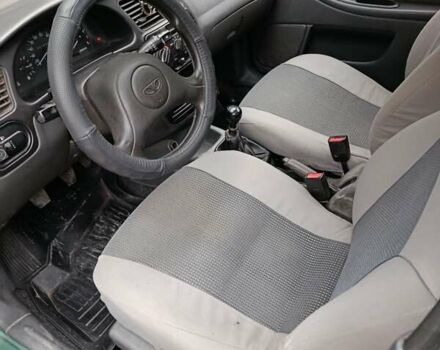 Зеленый Дэу Ланос, объемом двигателя 1.5 л и пробегом 241 тыс. км за 3000 $, фото 6 на Automoto.ua