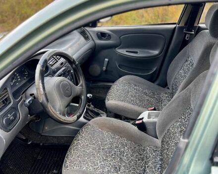 Зеленый Дэу Ланос, объемом двигателя 1.5 л и пробегом 220 тыс. км за 1850 $, фото 7 на Automoto.ua