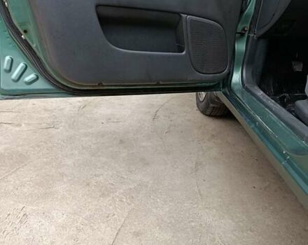 Зеленый Дэу Ланос, объемом двигателя 1.5 л и пробегом 241 тыс. км за 3000 $, фото 8 на Automoto.ua