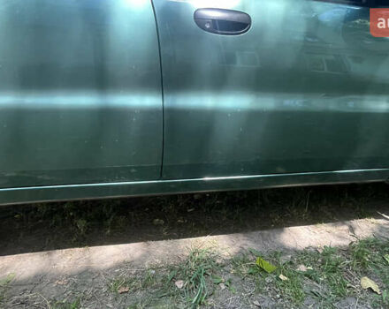 Зеленый Дэу Ланос, объемом двигателя 1.5 л и пробегом 198 тыс. км за 2750 $, фото 11 на Automoto.ua